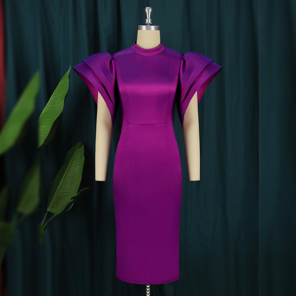 Schickes Damen Cocktailkleid figurbetont, mit modernen Puffärmeln und eleganter Linie, festlich.