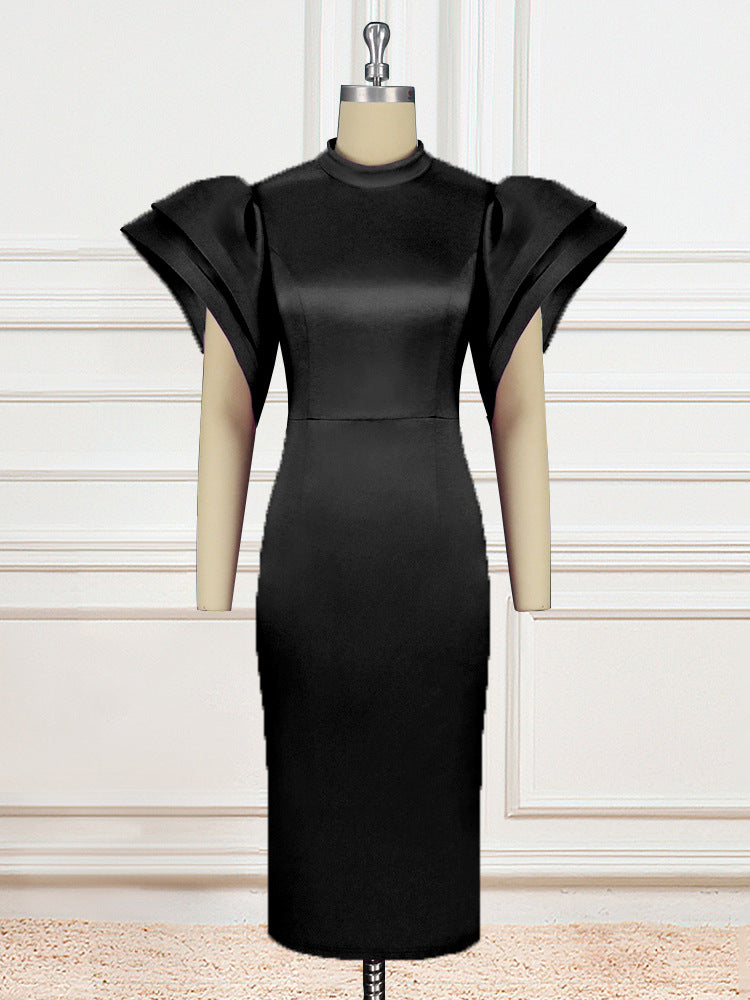 Detailansicht: Elegante Puffärmel am figurbetonten Damenkleid mit Rundhals, ein modisches Highlight für Partys.