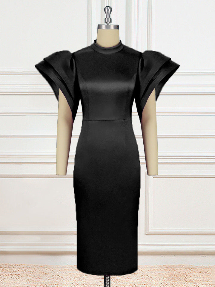 Detailansicht: Elegante Puffärmel am figurbetonten Damenkleid mit Rundhals, ein modisches Highlight für Partys.