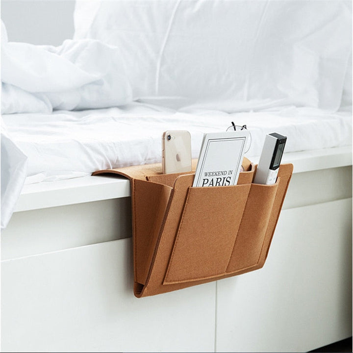 Universeller Filz-Organizer als praktische Aufbewahrungstasche für Bett, Couch und Sofa. Sorgt für mehr Ordnung.