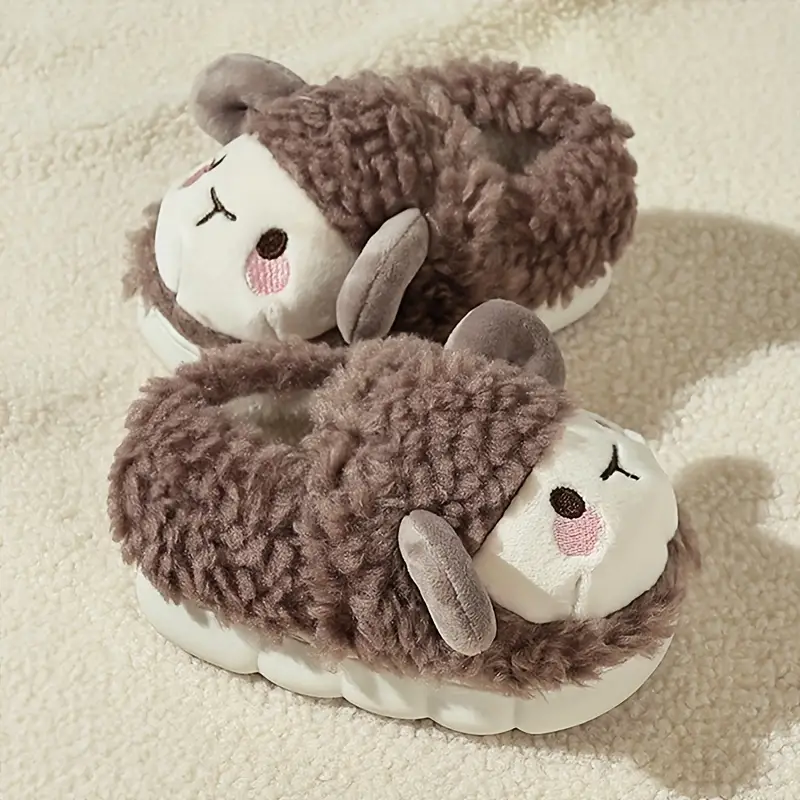Rutschfeste Flausch-Hausschuhe für Kleinkinder, mit Schaf-Design, sorgen für warme und sichere Füße.