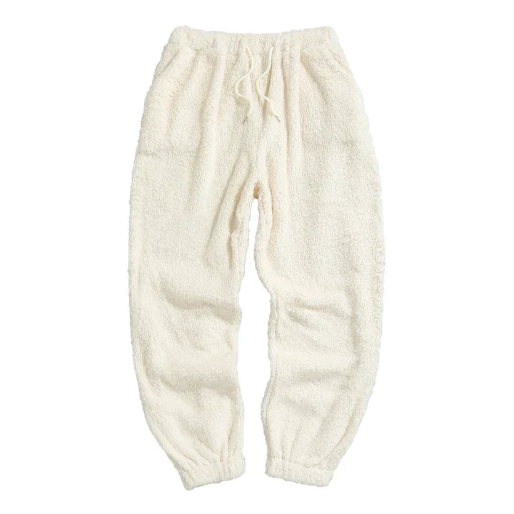Unisex Kuschel-Haushose Cara in Braun. Bequeme Loungewear für entspannte Stunden zu Hause.