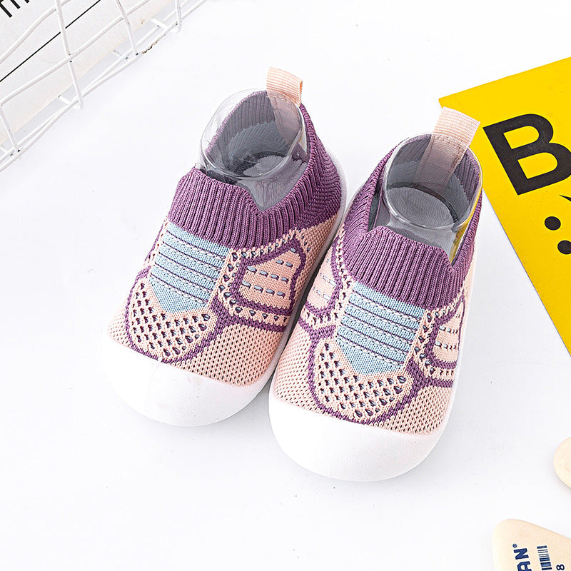 Lila Barfußschuhe für Babys, flexibel & rutschfest. Fördern gesunde Füße bei den ersten Gehversuchen.