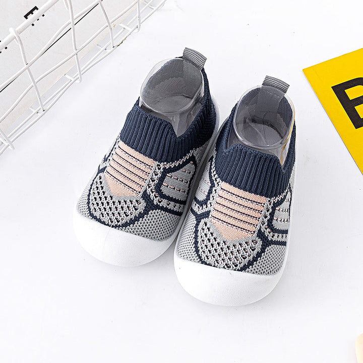 Dunkelblaue Babyschuhe, weich & flexibel. Rutschfeste Sohle für sichere erste Schritte von Kleinkindern.