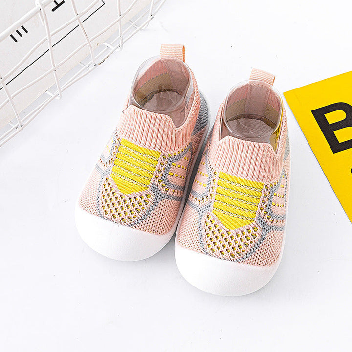 Barfußähnliche Lauflernschuhe in Grau, fördern gesunde Füße. Flexibel, weich & rutschfest für Babys.