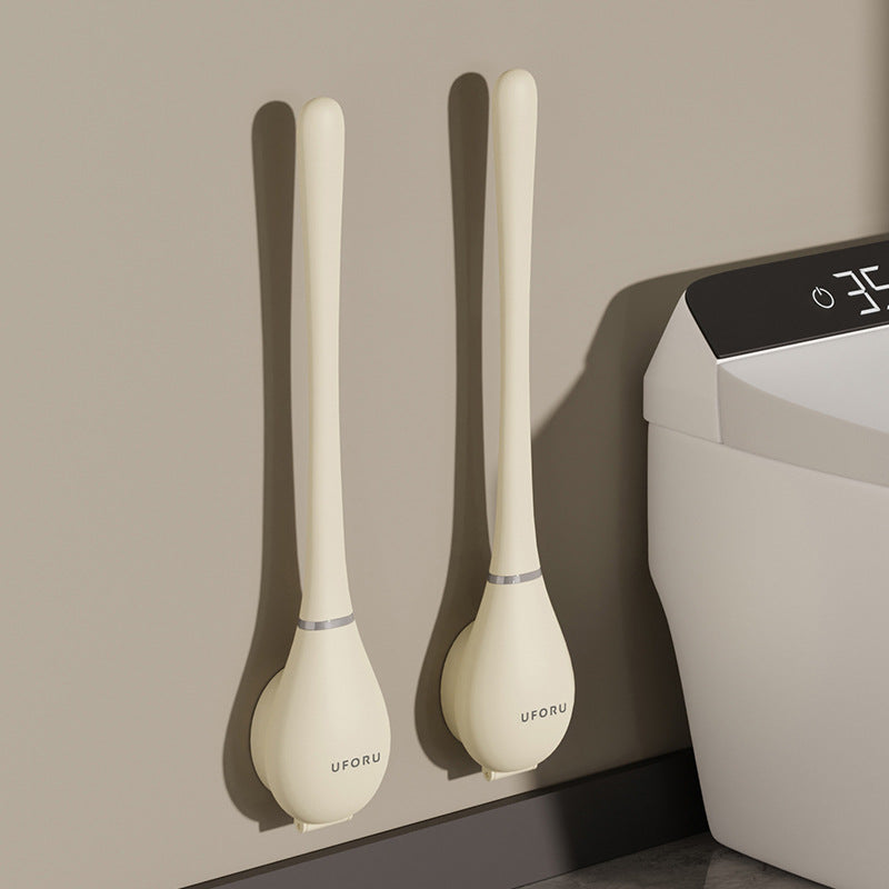 Minimalistische Toilettenbürste, flexibel für beste Hygiene, mit moderner Wandhalterung im Bad.