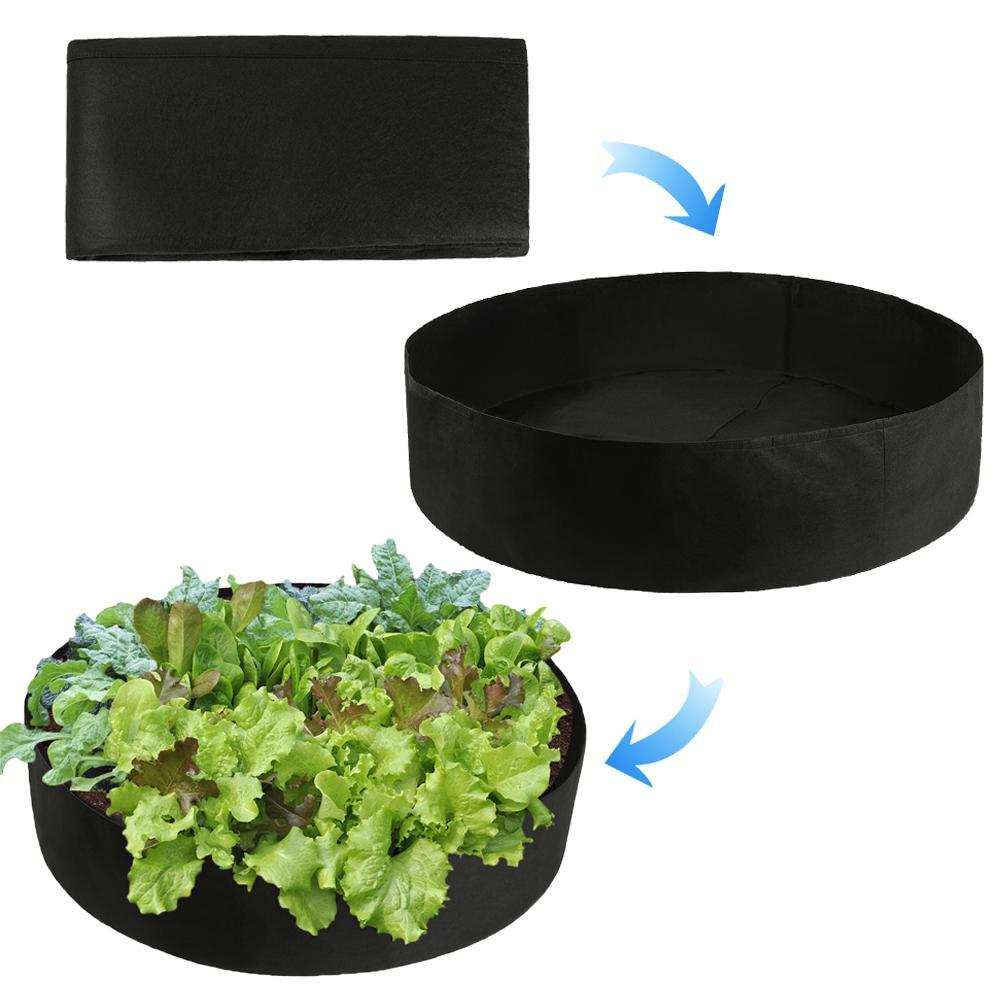 Großes Gartenstoff Hochbeet für den Anbau von frischem Gemüse, aromatischen Kräutern und bunten Blumen.