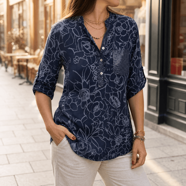 Lockere Damen Blumenbluse, Tunika mit 3/4-Ärmeln & Pailletten-Brusttasche für Freizeitmode.