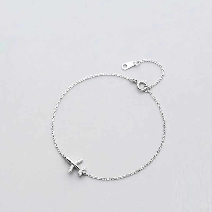 Unisex Silberarmband mit Flugzeug-Anhänger aus 925 Sterlingsilber, symbolisiert Reiseleidenschaft.