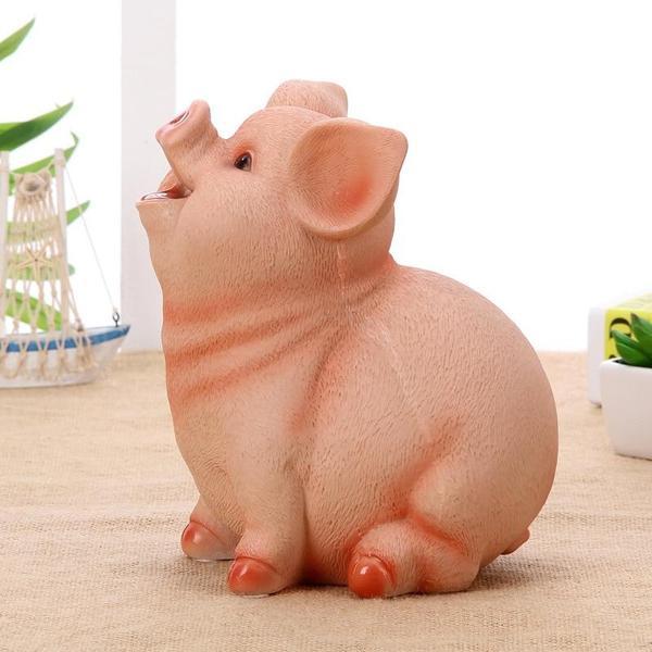 Fröhliches Sparschwein aus bruchfestem Naturharz. Realistische Tierfigur, ideal für Geldgeschenke & Kinderzimmer.
