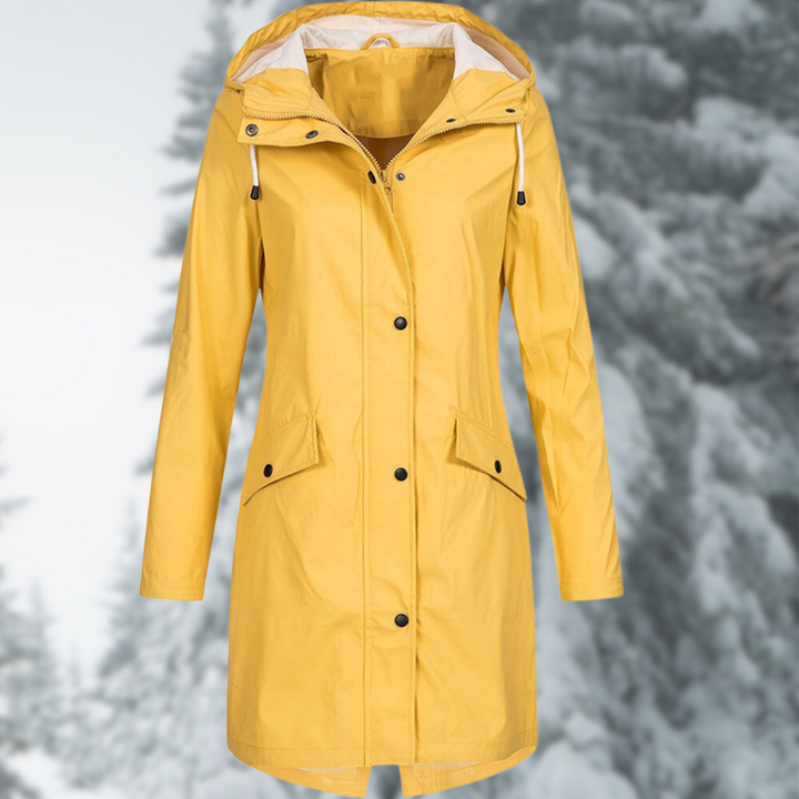 Stylisher, langer Damen Regenmantel mit Kapuze, wasserdicht & winddicht. Modische Damenjacke für jedes Wetter.