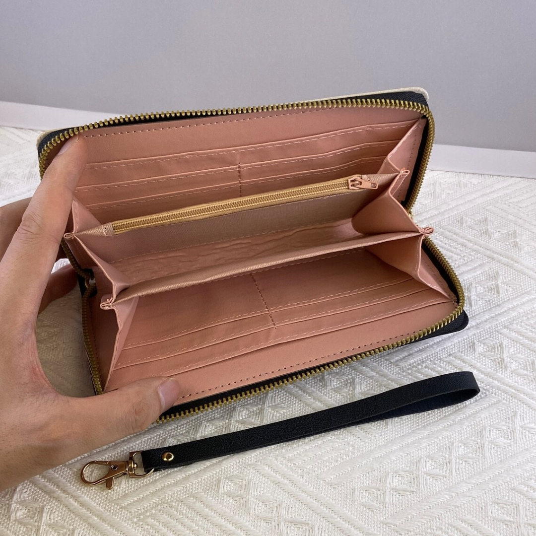 Hochwertige lange Geldbörse für Damen mit geometrischem Muster. Perfekte Geschenkidee für stilbewusste Frauen.