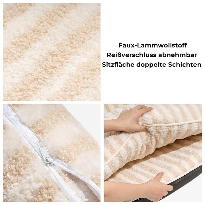 Entspannte Katze schläft tief im gestreiften Kuschelbett, umgeben von weichem Lammfelloptik-Stoff.