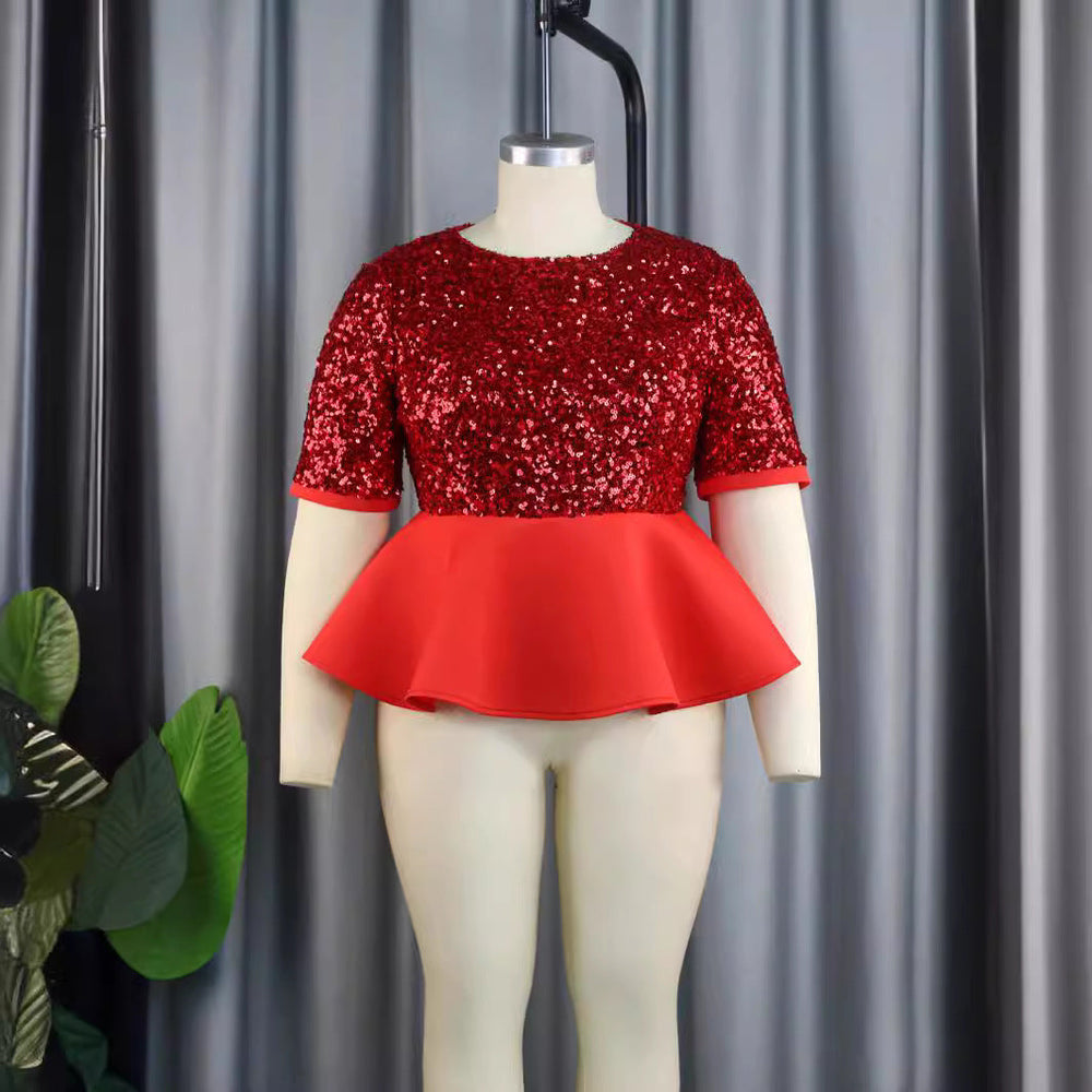Festliches Damen Glitzeroberteil mit schmeichelhaftem Peplum-Schnitt und Kurzarm für Abendgarderobe.