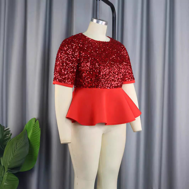 Elegantes Damen Glitzeroberteil mit Pailletten und Peplum-Design, ideal als Abendmode.