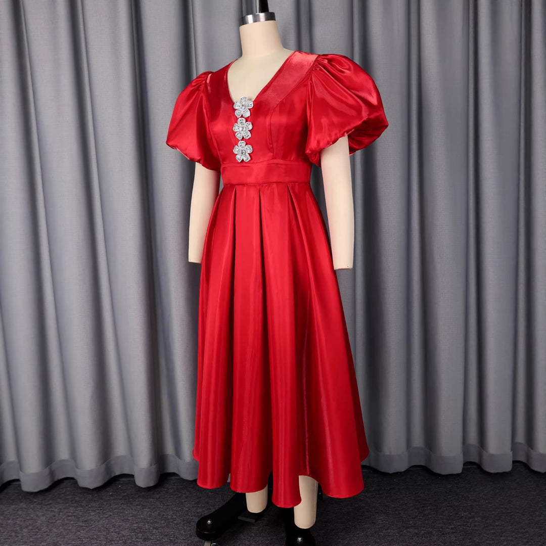 Extravagantes Damen Abendkleid rot, funkelnd mit Pailletten und dramatischen Puffärmeln, perfekt für Eleganz.