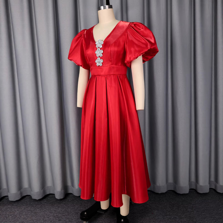 Extravagantes Damen Abendkleid rot, funkelnd mit Pailletten und dramatischen Puffärmeln, perfekt für Eleganz.