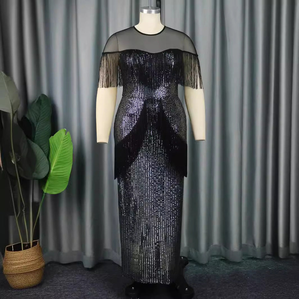 Festliches schwarzes Fransenkleid für Damen, glamourös mit Glanz-Effekt, ideal für Party und Abendveranstaltungen.
