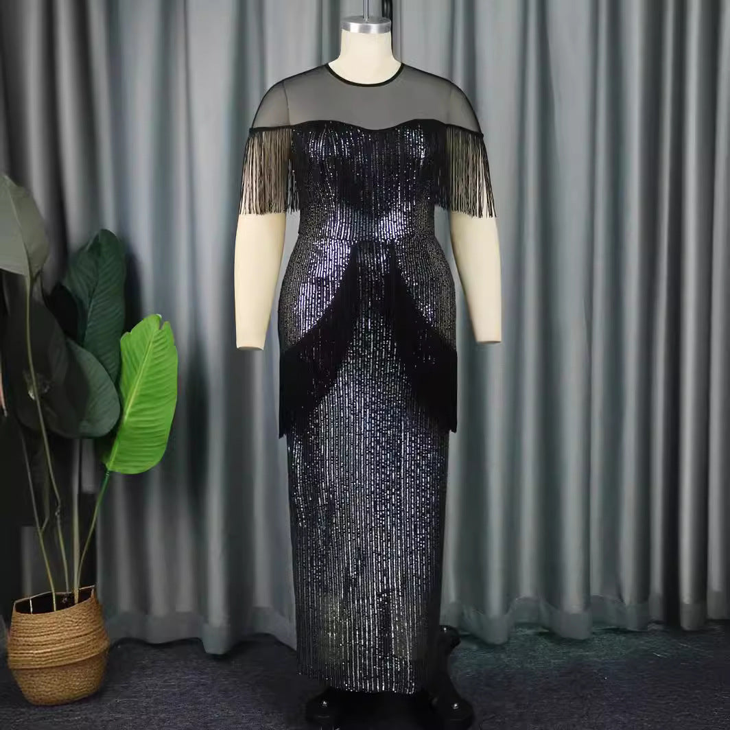 Festliches schwarzes Fransenkleid für Damen, glamourös mit Glanz-Effekt, ideal für Party und Abendveranstaltungen.