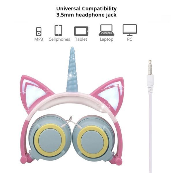 Vorderansicht der pink-weißen Einhorn Kopfhörer mit glitzerndem Horn, LED-Lichtern und Ohren für Kinder.