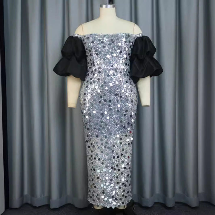 Festliches Damen Gala-Abendkleid mit funkelndem Glitzerstoff und eleganten, schulterfreien Puffärmeln für Eleganz.