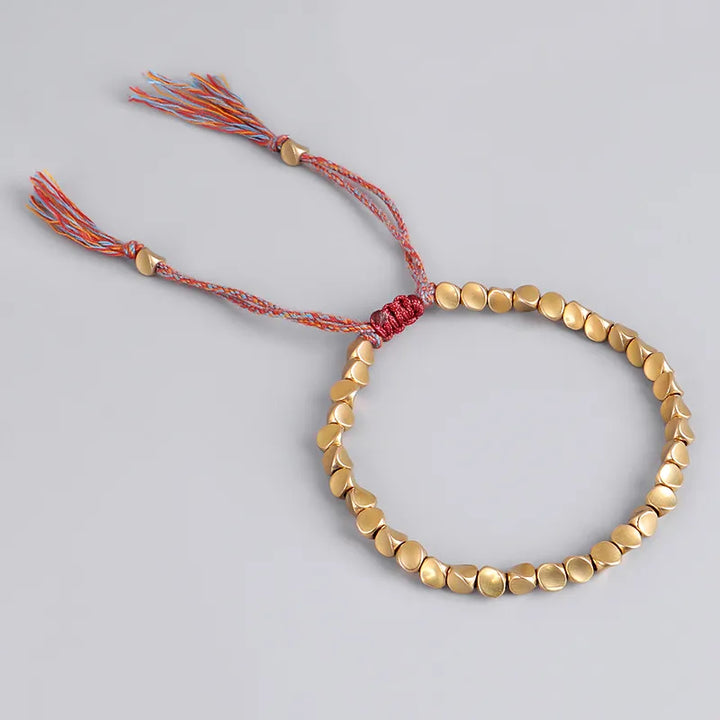 Unisex Schmuckarmband, elastisch, mit schimmernden Kupferperlen gefertigt, zeitloses Design.