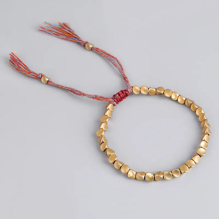 Spirituelles Damen Armband im tibetischen Stil, handgefertigt, symbolisiert Harmonie und innere Ruhe.