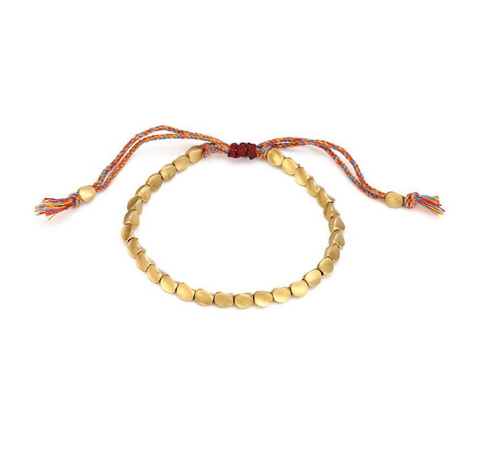 Spirituelles Unisex Glücksarmband mit geometrischen Kupferperlen als eleganter Schmuck.