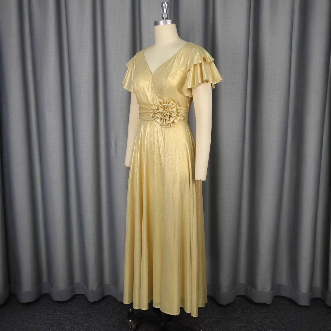 Elegantes goldenes Partykleid für Damen, mit tiefem V-Ausschnitt & beeindruckenden Rüschen. Festlich & schick.