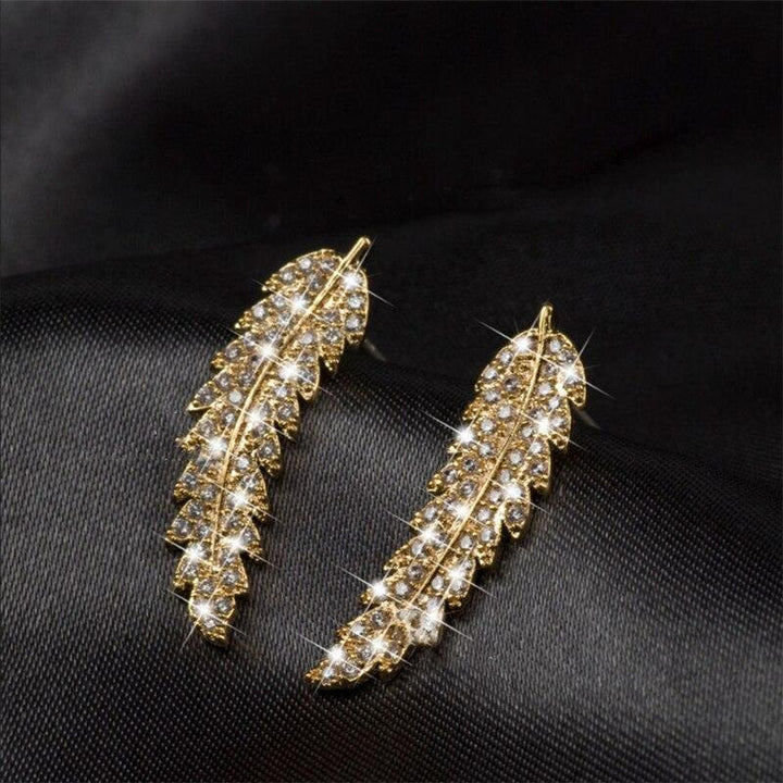 Exquisite Damenohrringe: Engelsflügel-Design, Ausdruck spiritueller Eleganz. Moderner, ansprechender Schmuck.