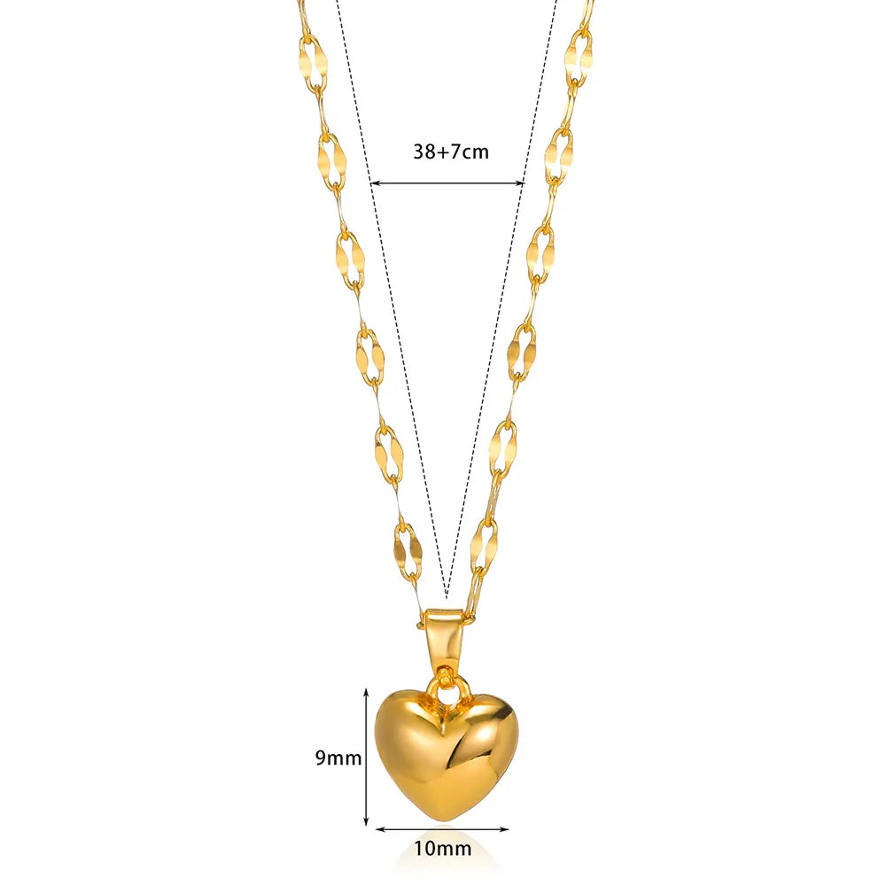 Zeitlose Damen Herz-Halskette aus glänzendem goldfarbenem Edelstahl. Edler Schmuck-Anhänger, ideales Geschenk für Frauen.