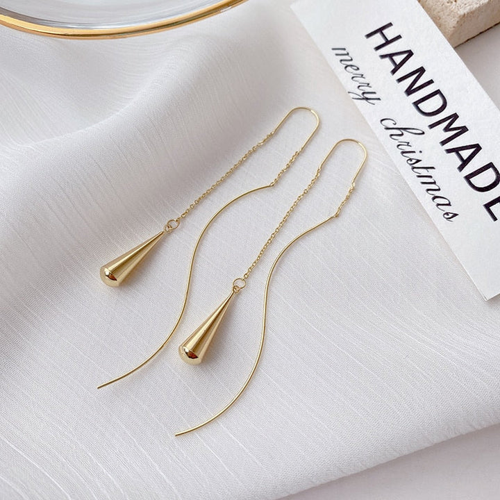 Glänzende goldfarbene Wassertropfen-Ohrringe, Damenschmuck aus Legierung, elegantes Design.