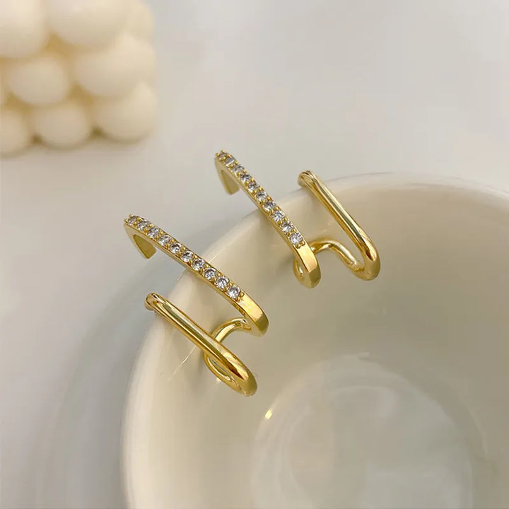 Hochwertige Damen Schmuck-Ohrstecker mit funkelnden Kristallen, die einen einzigartigen Illusion-Look bieten.
