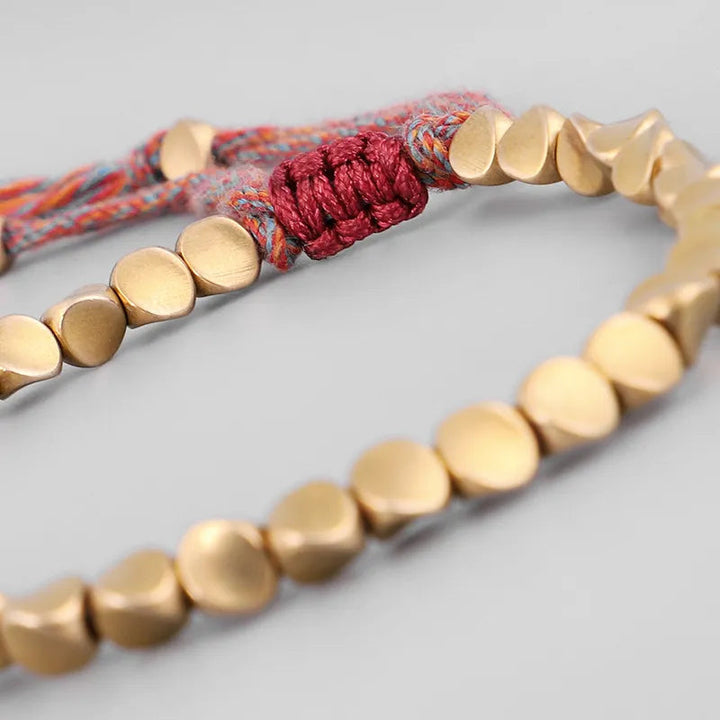 Damen Edelstahl Armband, tibetisch inspiriert, handgefertigt, fördert Harmonie und spirituelle Gelassenheit.