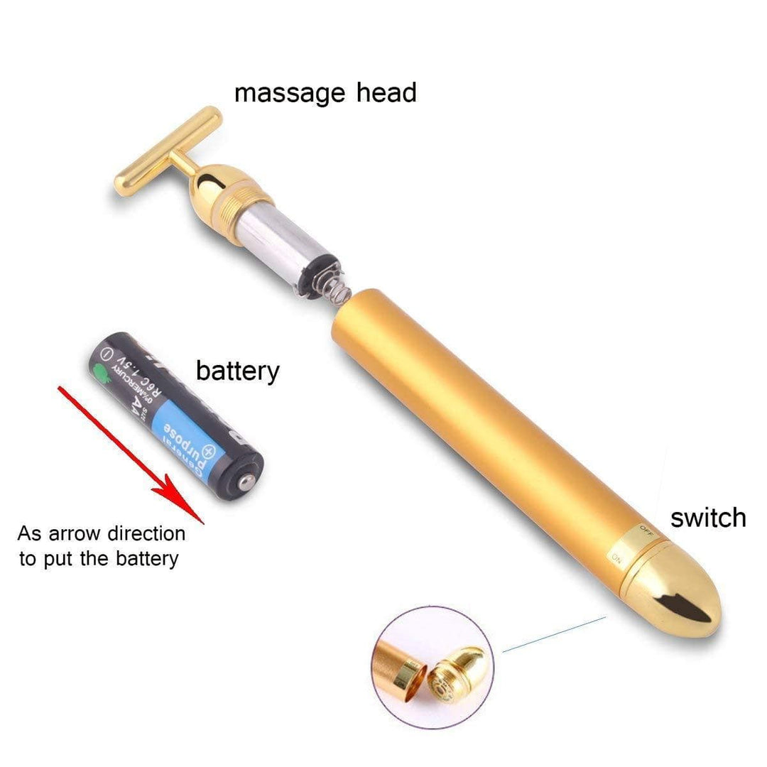 Goldener T-Bar Vibrationsmassager für eine effektive Anti-Aging-Gesichtspflege.
