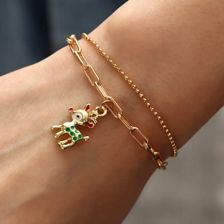 Elegantes Damen Gliederketten Armband mit vielfältigen festlichen Weihnachts-Charms für den Winter.