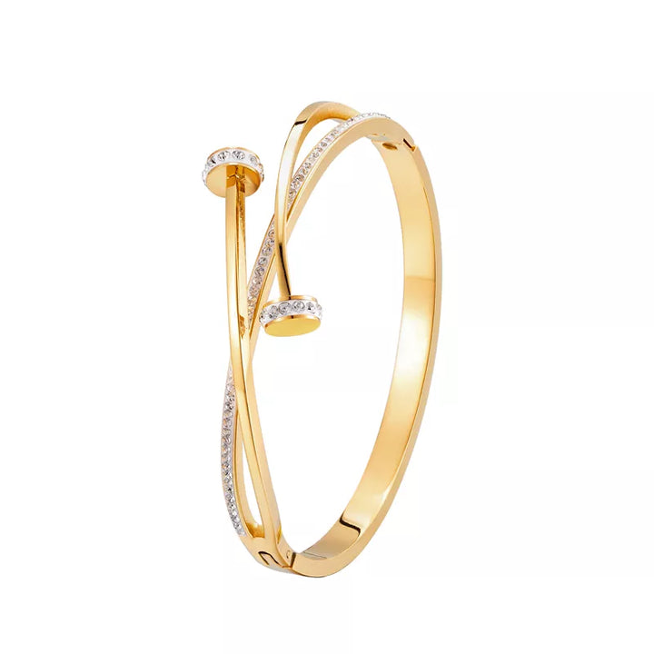Elegantes Damen Nagelkopf-Armband mit funkelnden Kristallen. Ein glamouröses Modeaccessoire für Frauen.