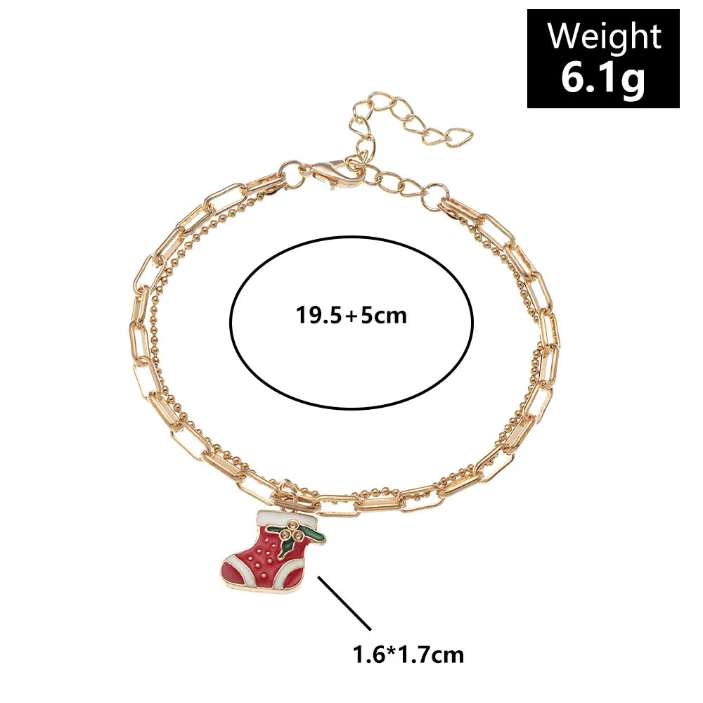 Damen Winterzauber Charme Armband mit detaillierten Weihnachts-Anhängern, festlich & elegant.