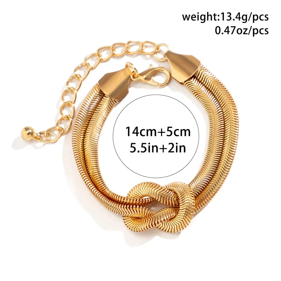 Elegantes Damen-Armband, geknotete Schlangenkette in Gold- und Silber-Optik, Vintage-Schmuck.