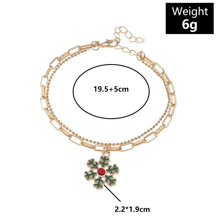Stilvolles Damen Armband, festlicher Weihnachtsschmuck mit diversen winterlichen Charms.