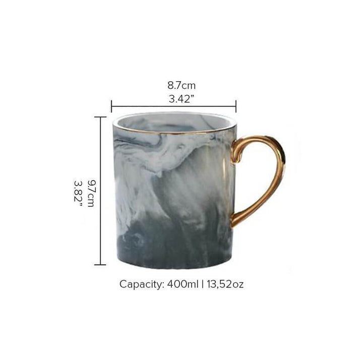 Hochwertige goldrandige Keramik Kaffeetasse mit Marmor-Design, ideal als edles Geschirr.