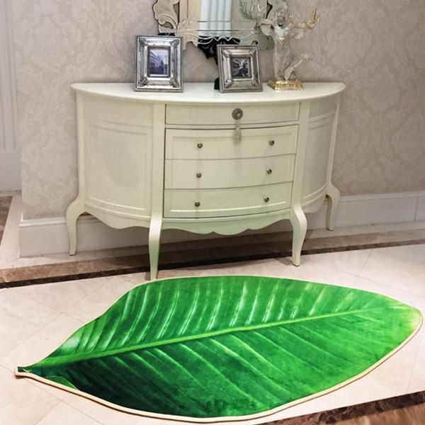 Dekorativer Blatteppich in Grün, realistisches Design. Weicher Flanell, rutschfest. Für Wohn- & Schlafzimmer.