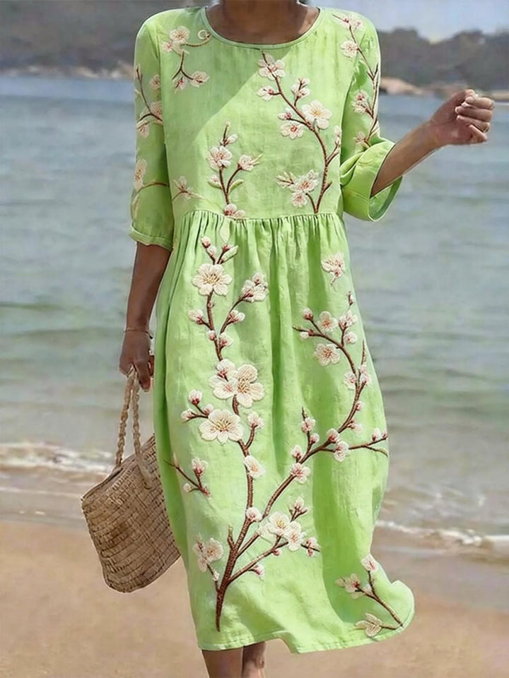 Grünes, lässiges Damen Sommer-Midikleid mit Ellbogenärmeln und Blumenmuster, perfekt für Freizeit & Alltag.