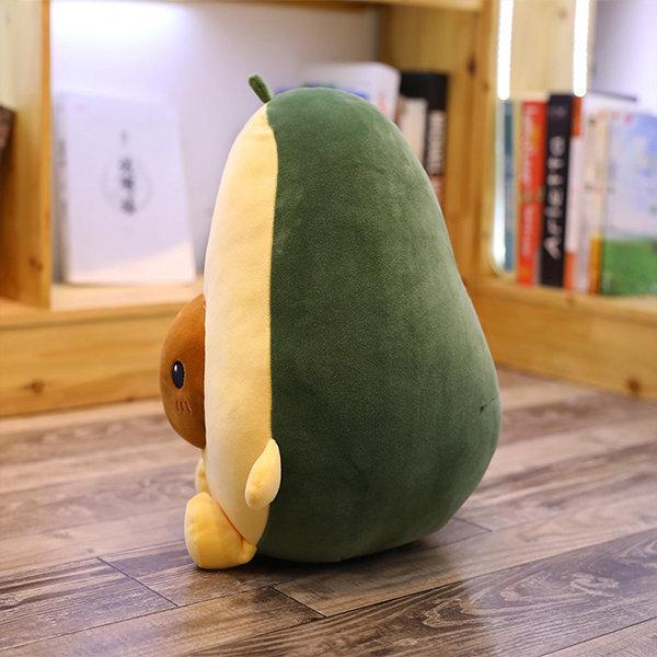 Niedliches Avocado Kuscheltier, ideal als Dekokissen im Kinderzimmer oder süßes Stofftier.