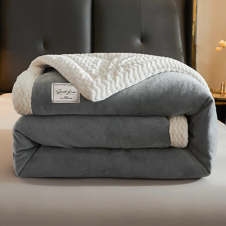 Winterdecke, Kuscheldecke, Wohndecke: Eine luxuriöse, warme Heimtextilie für maximale Gemütlichkeit im Winter.