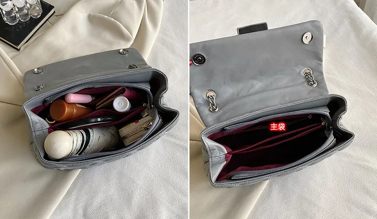 Majestätische Damen Handtasche, gesteppt, mit edlen Metall-Akzenten.