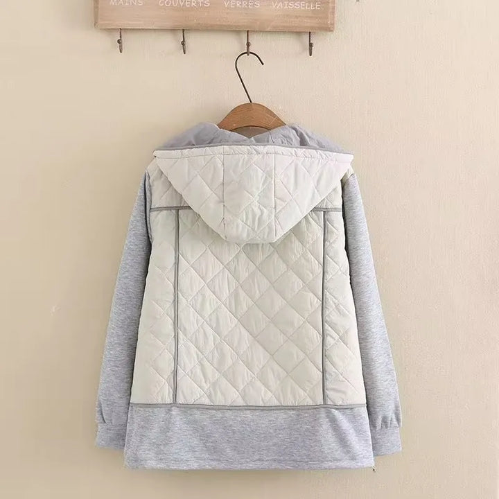 Warme Damen Übergröße Steppjacke mit Kapuze, perfekt als Freizeit- und Winterjacke.