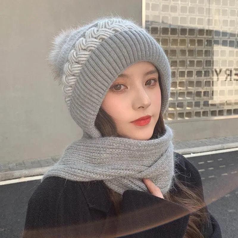 Damen Winterset: Kuschelige Mütze und wärmender Schal für kalte Tage. Trendige Wintermode Accessoires.