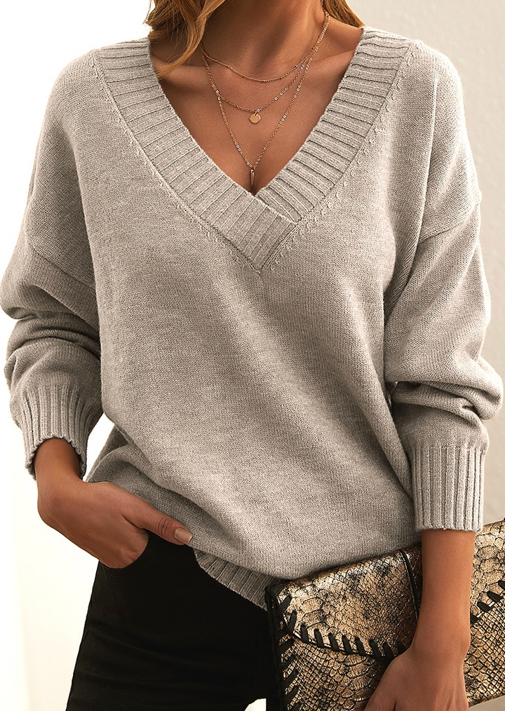 Vielseitiger Damen Strickpullover mit V-Ausschnitt, elegantes Design für Freizeit und Arbeit.