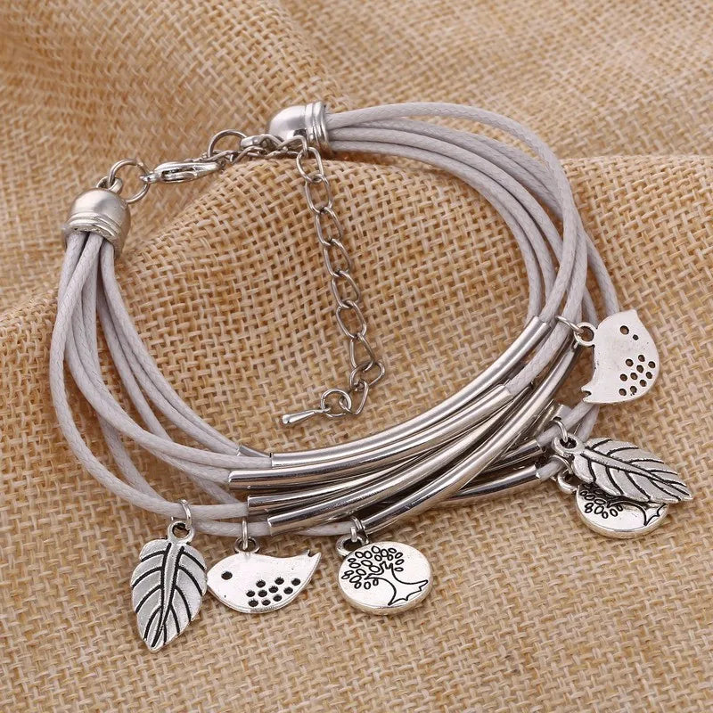 Bohemian Unisex-Armband, mehrschichtig, mit Blätter- und Vogel-Motiven.
